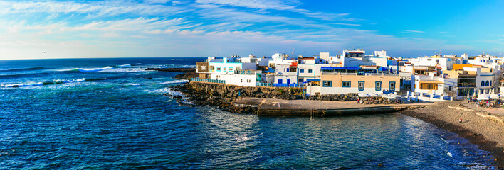 Scenic colorful traditional villages of Fuerteventura - El Cotillo. Canary islands - obrazy, fototapety, plakaty
