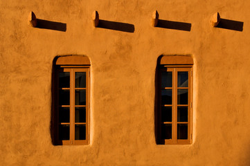 Fototapeta premium Windows, Viga’s casting shadows and Adobe Walls, Santa Fe, New Mexico 