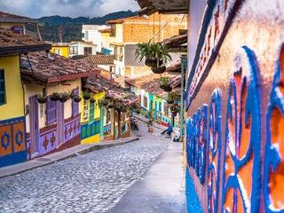 Guatape, Colombia - Jan 12 19 - Colorfully decorated houses in the town center of Guatape, Colombia