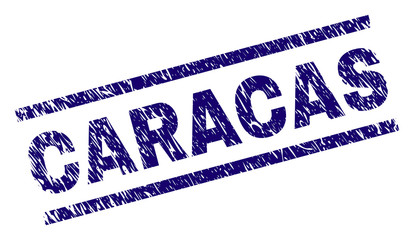 CARACAS seal print with grunge style. Blue vector rubber print of CARACAS label with retro texture. Text label is placed between parallel lines.
