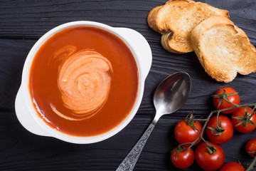 Fresh tomato cream soup in bowl
