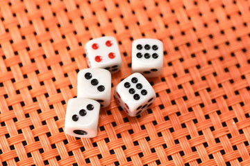 dices on orange background