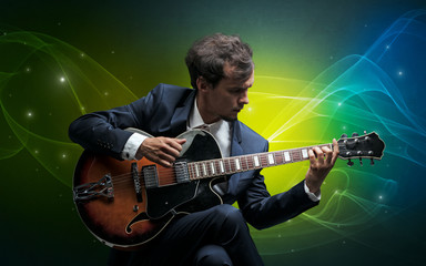 Serious classical guitarist with fabled sparkling wallpaper