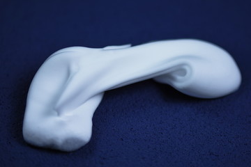 white foam  isolated on  dark background