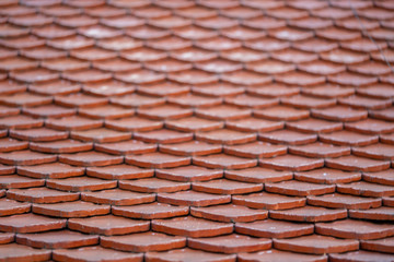 Red tiled roof of temple in Thailand