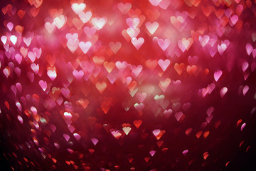 Bright red hearts abstract bokeh background