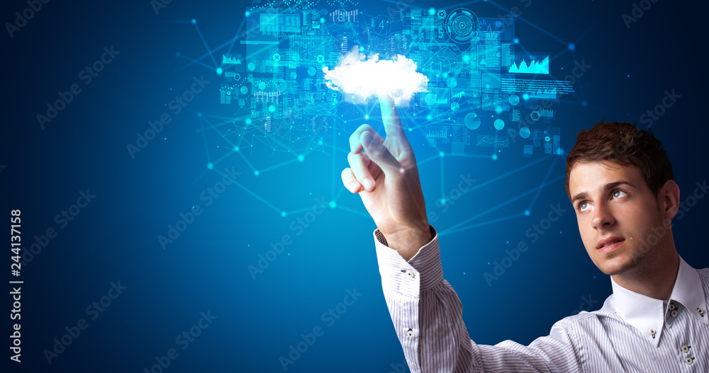 Aufkleber Man touching hologram projection displaying information from cloud based system
