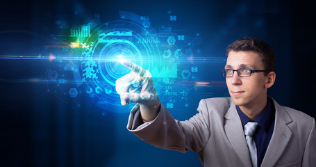 Man touching hologram screen displaying medical symbols and charts
