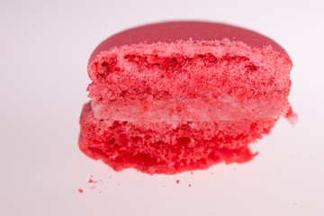 pink  macarons on white background