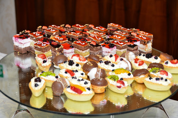 platter with wedding cakes