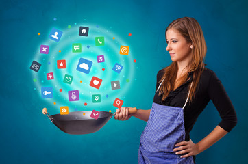 Young happy person cooking applications in wok
