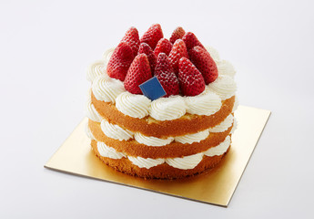 Delicious strawberry cake on white background