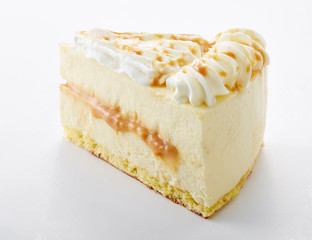 Delicious little cake cut pieces on a white background