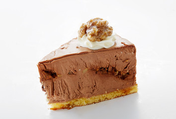 Delicious little cake cut pieces on a white background