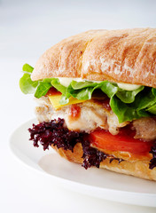 Delicious chicken hamburger on a white background