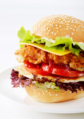 Delicious fried chicken hamburger on a white background