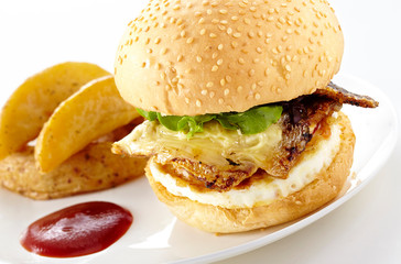 Tasty burger with french fries on a white background