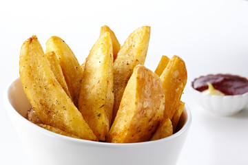 Delicious french fries on a white background