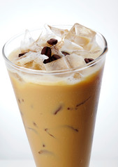 Delicious iced coffee drink over white background