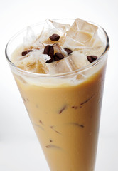 Delicious iced coffee drink over white background