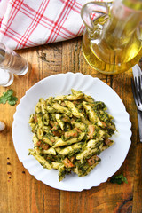 Penne pasta with spinach and meat