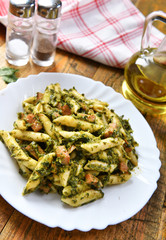 Penne pasta with spinach and meat