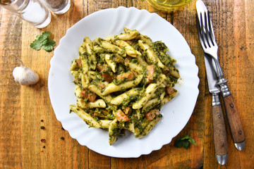 Penne pasta with spinach and meat