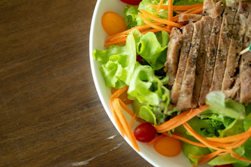 Pork steak in a restaurant with beautiful dishes