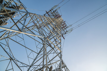 power transmission tower on background of blue sky