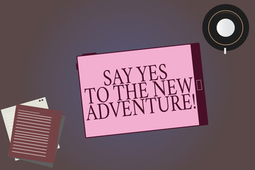 Conceptual hand writing showing Say Yes To The New Adventure. Business photo showcasing Exploring the world traveling life experience Tablet Screen Saucer and Filler Sheets on Color Background