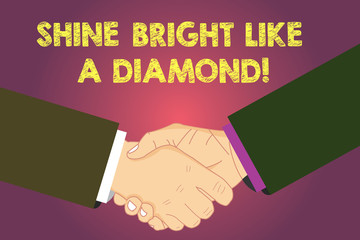 Word writing text Shine Bright Like A Diamond. Business concept for Be always cheerful brilliant glamorous Hu analysis Shaking Hands on Agreement Greeting Gesture Sign of Respect photo