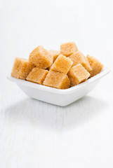 some sugar on white wooden table
