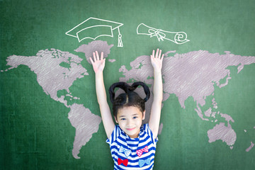 Scholarship opportunity and education success concept with school kid with doodle drawing of graduation cap on green chalkboard.