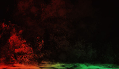 Abstract red vs green smoke steam moves on a black background . The concept of aromatherapy