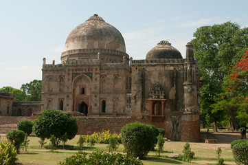 Fototapeta na wymiar Bada Gumbad mosque in Lodi Park on a sunny afternoon. Delhi, India