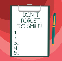 Text sign showing Don T Forget To Smile. Conceptual photo Be always cheerful smiley spread and show happiness Blank Sheet of Bond Paper on Clipboard with Click Ballpoint Pen Text Space
