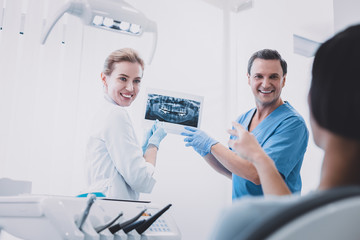 Obraz premium Kind male person talking to his patient