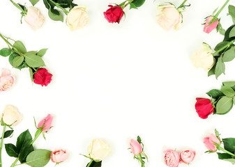 Flowers background. Border frame of beautiful pink and red roses on  white background. Holiday background. Top view.Copy space