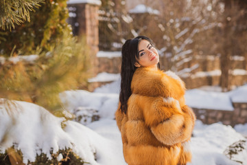 Cold season concept,  fashionable arabic woman in fur coat, fashion for lady