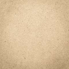 Particle pressed wood panel osb oriented strand board texture pattern background in light beige cream yellow gold color