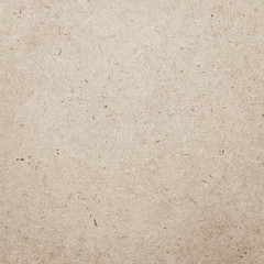 Particle pressed wood panel OSB - oriented strand board texture background in light brown beige cream color