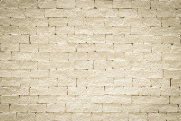 Brick wall pattern texture background painted in light antique yellow cream color
