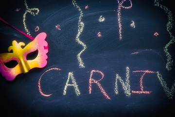 carnival mask with blackboard painted background
