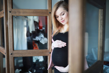 Pregnant young beautiful girl on the ninth month