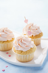 Valentine Day cupcakes decorated with hearts for dessert.