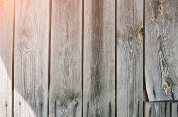 Naklejka premium Old vintage wooden planks of the house. Grey wood texture background.