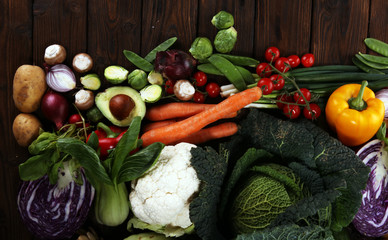 Composition with variety of raw organic vegetables and fruits. Balanced diet