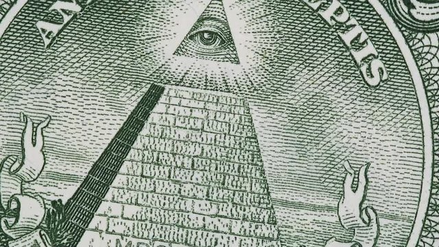 Great seal on 1 US dollar bill slow rotating, pyramid and Eye of Providence. Stock video footage