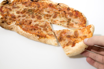 Taking a slice of pizza isolated in a white background