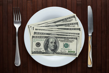 Top view of the dish with dollars. Conceptual photo. - 244167197